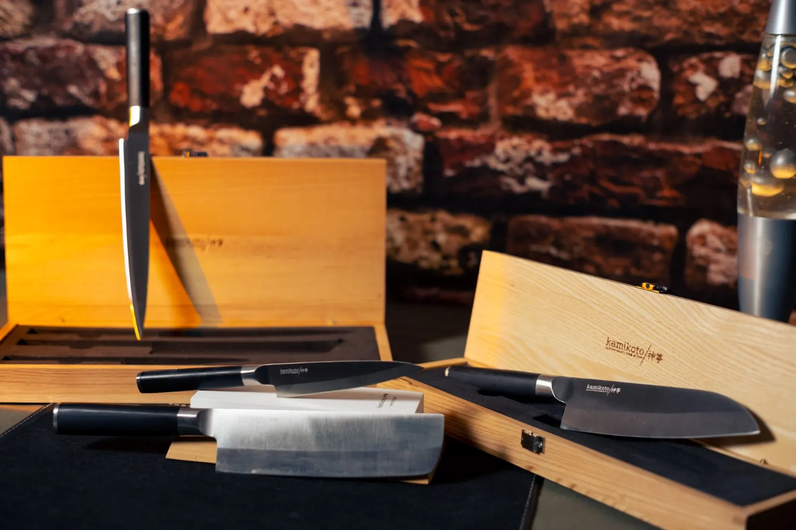 Kamikoto knives styled on a wooden box